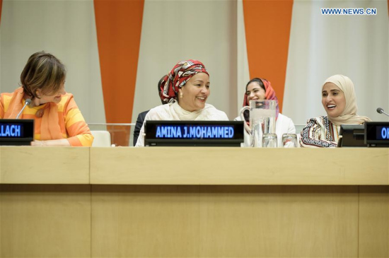 UN Deputy Secretary-General Amina J. Mohammed (C) attends an event to mark the International Day of Happiness at the UN headquarters in New York, on March 20, 2017. (Xinhua/UN Photo/Manuel Elias)