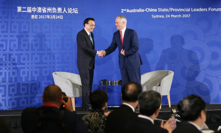 Chinese Premier Li Keqiang (L) shakes hands with Australian Prime Minister Malcolm Turnbull at the 2nd Australia-China State/Provincial Leaders Forum in Sydney, Australia, March 24, 2017. (Xinhua/Yao Dawei)