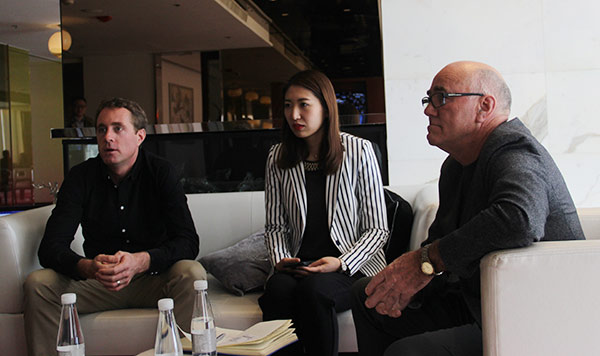 Healthpost's CEO Abel Butler (left), China country manager Harriet Zhou (center), and chairman Peter Butler speak with China Daily in Beijing on March 17, 2017. (Photo provided to chinadaily.com.cn)