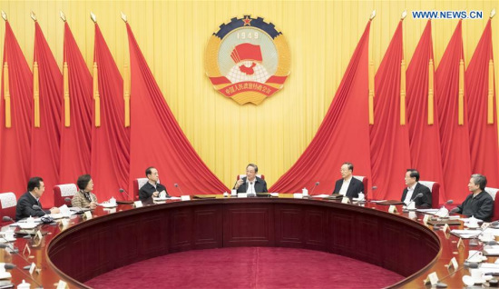 Yu Zhengsheng (C), chairman of the National Committee of the Chinese People's Political Consultative Conference (CPPCC), presides over a meeting of the chairman and vice chairpersons of the CPPCC National Committee in Beijing, capital of China, Feb. 28, 2017. (Xinhua/Ding Haitao)