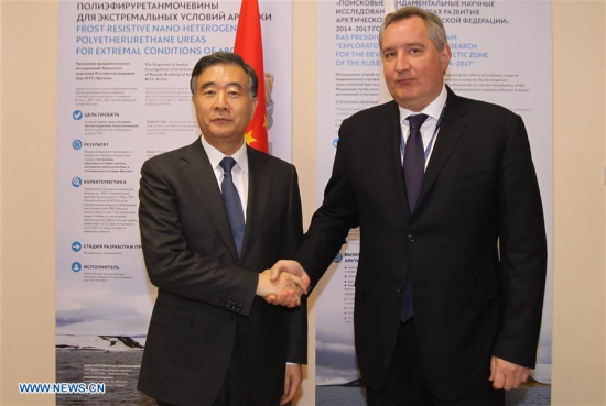 Chinese Vice Premier Wang Yang (L) shakes hands with Russian Deputy Prime Minister Dmitry Rogozin before they co-chair a session of the committee for the regular meeting of Chinese and Russian heads of government in Arkhangelsk, Russia on March 29, 2017. (Xinhua/Lu Jinbo)