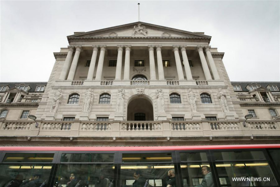 A bus drives past the Bank of England after the British government triggered Article 50 of the Lisbon Treaty, in London, Britain on March 29, 2017. The Britain on Wednesday officially started the historic process to leave the European Union (EU) as the letter signed by Prime Minister Theresa May is sent to leaders of the bloc. (Xinhua/Tim Ireland)