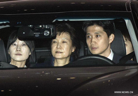 Former South Korean President Park Geun-hye (C) is transferred in a car from Seoul to a detention house in Gyeonggi province, South Korea, on March 31, 2017. Former President Park Geun-hye of South Korea was arrested early Friday as a Seoul court approved the request from prosecutors following her impeachment earlier this month over a corruption scandal embroiling her. (Xinhua/Pool/Lee Young-ho)