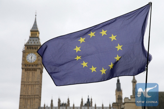 An EU flag is seen outside the the Houses of Parliament in London, Britain on March 29, 2017. (Xinhua/Tim Ireland)