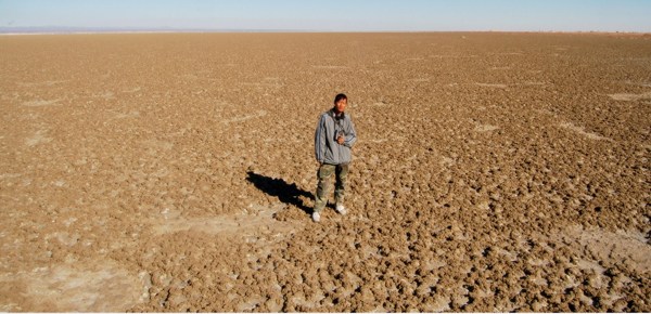 Li Fei, a postgraduate student from Beijing Forestry University, investigates Har Lake in 2007. (Photo/Xinhua)