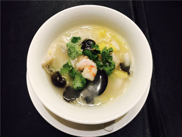 Penglai noodles by Hu Limei at Hilton Beijing Wangfujing on March 2, 2017. (Photo by Jiang Wanjuan/chinadaily.com.cn)