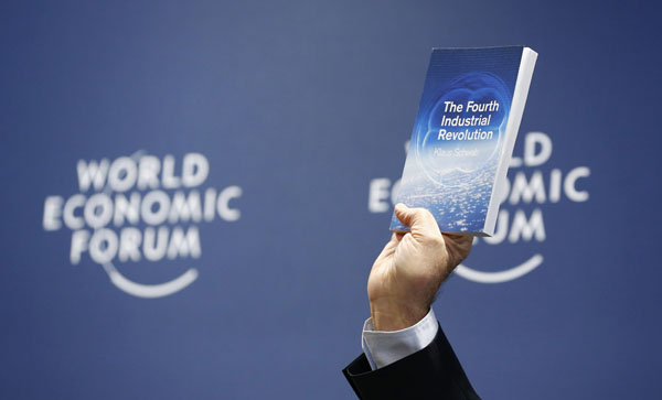 World Economic Forum (WEF) Executive Chairman and founder Klaus Schwab presents his book, The Fourth Industrial Revolution, during a news conference in Cologny, near Geneva, Jan 13, 2016. (Photo/Agencies)