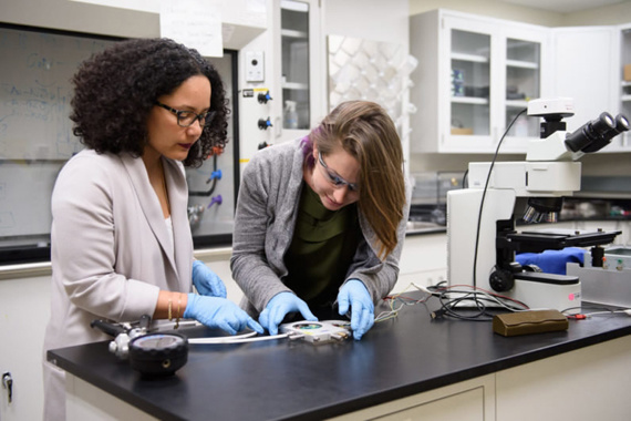 Professor Debbie Senesky, left, works with graduate student Caitlin Chapin on electronics that can resist extreme environments. (Photo/Stanford University)