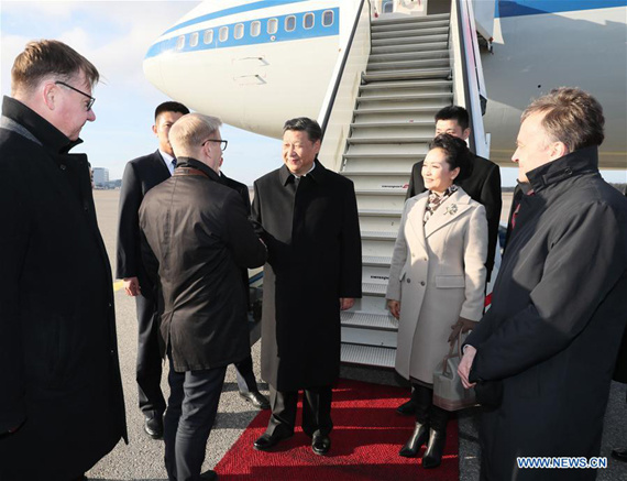 Chinese President Xi Jinping and his wife Peng Liyuan are welcomed by Finnish Minister of Agriculture and the Environment Kimmo Tiilikainen at the airport upon their arrival in Helsinki, Finland, April 4, 2017. Chinese President Xi Jinping arrived here Tuesday for a state visit to Finland. (Xinhua/Lan Hongguang)