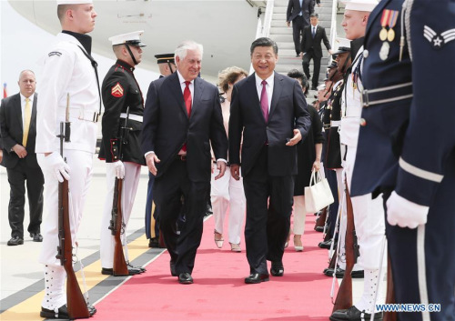 Chinese President Xi Jinping and his wife Peng Liyuan are welcomed by U.S. Secretary of State Rex Tillerson and his wife upon their arrival at Palm Beach International Airport in Florida, the United States, April 6, 2017. Xi arrived here for the first meeting with U.S. President Donald Trump. (Xinhua/Lan Hongguang)