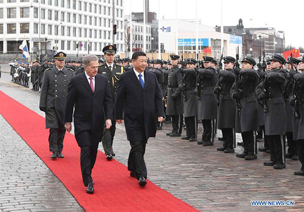 President Xi Jinping attends a welcoming ceremony held by his Finnish counterpart Sauli Niinisto before their talks in Helsinki, Finland, April 5, 2017. (Photo/Xinhua)