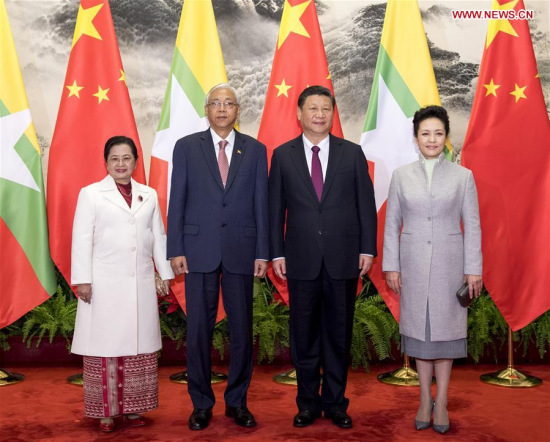 Chinese President Xi Jinping (2nd R) and his wife Peng Liyuan (1st R) pose for a photo with Myanmar President U Htin Kyaw (2nd L) and his wife in Beijing, capital of China, April 10, 2017. Xi held a welcome ceremony for Myanmar President U Htin Kyaw before their talks here on Monday. (Xinhua/Li Xueren)