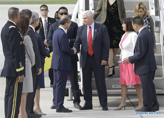 U.S. Vice President Mike Pence (3rd R, front) arrives in Osan Air Base, South Korea on April 16, 2017.    (Xinhua/Lee Sang-ho)