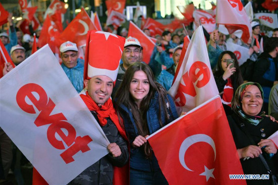 Turkish citizens celebrate the victory of referendum in Ankara, capital of Turkey, on April 16, 2017. Turkey voted to support constitutional change with Yes votes leading on 51.3 pct in the historic referendum after 99 pct count of vote, the state-run Anadolu Agency reported on Sunday. (Xinhua/Mustafa Kaya)