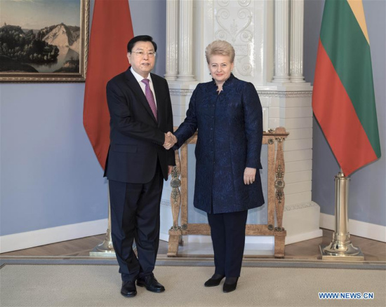 Zhang Dejiang (L), chairman of the Standing Committee of China's National People's Congress, meets with Lithuanian President Dalia Grybauskaite in Vilnius, capital of Lithuania, April 14, 2017. Zhang paid an official goodwill visit to Lithuania on April 14-16. (Xinhua/Li Tao)