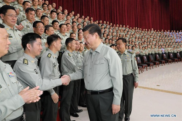 Chinese President Xi Jinping, who is also general secretary of the Communist Party of China (CPC) Central Committee and chairman of the Central Military Commission (CMC), meets with military officers during an inspection of the Southern Theater Command of the People's Liberation Army (PLA), April 21, 2017. (Xinhua/Li Gang)