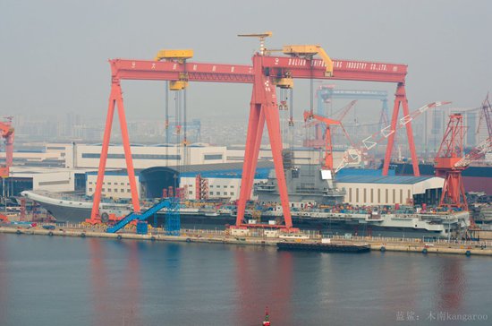 A distant view of China's first domestically-built aircraft carrier, which will soon be launched (Photo/Courtesy of Blue Shark Team)