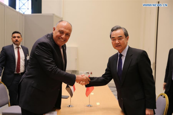 Chinese Foreign Minister Wang Yi (R, front) shakes hands with his Egyptian counterpart Sameh Shoukry (L, front) during their meeting on the sidelines of the Ancient Civilization Forum in Athens, Greece, on April 24, 2017. (Xinhua/Lefteris Partsalis)