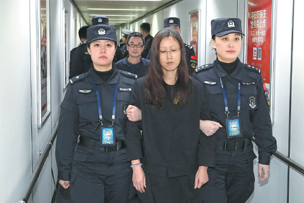 Zhang Qingzhao, who featured on an Interpol list of China's 100 most-wanted fugitives was repatriated from the Caribbean state of Saint Vincent and the Grenadines on Feb 6, 2016. [Photo/Xinhua]