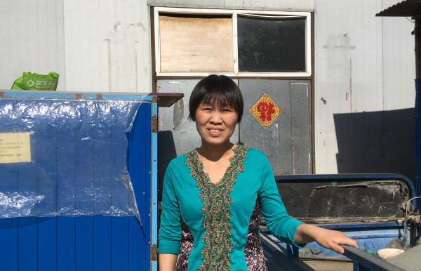 Fan Yusu, 44, from a village in Xiangyang, Central China's Hubei province now does housekeeping work in Beijing. (Photo/Beijing Youth Daily)