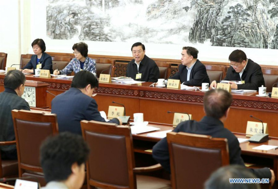 Zhang Dejiang (C, rear), chairman of the National People's Congress (NPC) Standing Committee, joins lawmakers in deliberation of State Council reports on environmental protection and supply-side structural reform at panel discussions of the ongoing 27th session of the 12th NPC Standing Committee in Beijing, capital of China. (Xinhua/Ma Zhancheng)
