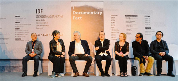 The international jury of the film festival includes French filmmaker Yves Jeanneau (third left) and Chinese director Fu Hongxing (center). (Photo provided to China Daily)