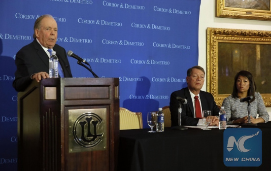 Lawyer Thomas Demetrio(L), who is representing David Dao, the passenger who was violently dragged off an overbooked United Airlines flight, speaks as lawyer Stephen Golan (C) and Dao's daughter Crystal Dao Pepper look on during a press conference in Chicago, Illinois, the United States, on April 13, 2017. (Xinhua/Wang Ping)