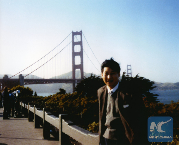 File photo taken in 1985 shows Xi Jinping, then secretary of the Zhengding County Committee of the Communist Party of China, poses for a photo as he visits San Francisco in the United States. (Xinhua)