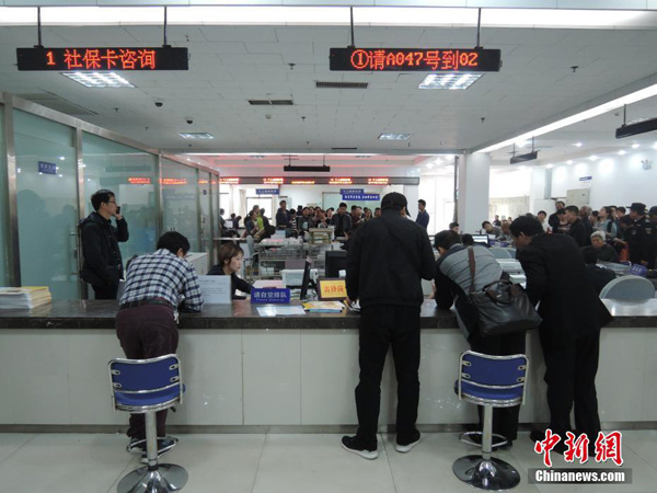 People at a social insurance service hall in Zhengzhou, Central China's Henan province, on Monday. (Photo/Chinanews.com)