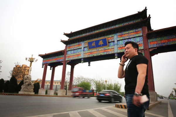 Zhang Peng, a native of Xiongxian county, is an investor in the county's ecological agriculture. He returned from Baoding where he finished his schooling and started his career. (Photo by Wang Weiqian/For China Daily)