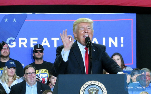 U.S. President Donald Trump (Front) delivers a speech during a rally marking his first 100 days in office in Harrisburg, Pennsylvania, the United States, April 29, 2017. (File photo： Xinhua/Yan Liang)