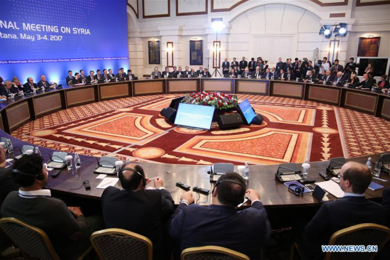 Photo taken on May 4, 2017 shows the meeting of Syria peace talks in Astana, Kazakhstan. Russia, Iran and Turkey signed a memorandum on the creation of four safe zones in war-torn Syria here on Thursday. (Xinhua/Ospanov)