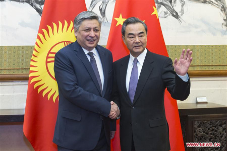 Chinese Foreign Minister Wang Yi (R) holds talks with his Kyrgyz counterpart Erlan Abdyldaev in Beijing, capital of China, May 5, 2017. (Xinhua/Cui Xinyu)