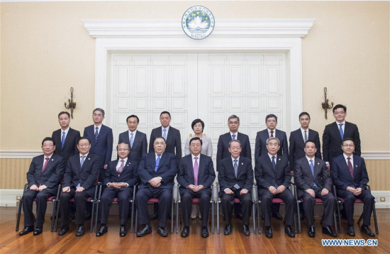 Zhang Dejiang, chairman of the Standing Committee of the National People's Congress, poses for a group photo with principal officials of Macao Special Administrative Region (SAR) government in Macao, south China, May 8, 2017.  (Xinhua/Li Xueren) 