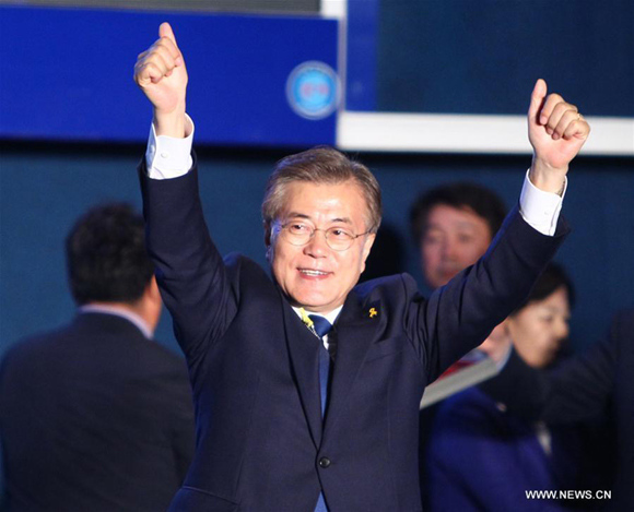 Moon Jae-in of the liberal Minjoo Party waves during a celebration event in Seoul, South Korea, on May 9, 2017. (Xinhua/Yao Qilin)