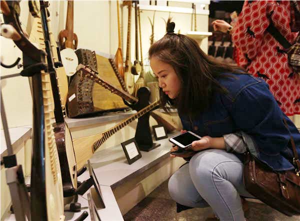 An exhibition of musical instruments is held at the Central Conservatory of Music in Beijing. Photos by Feng Yongbin/China Daily