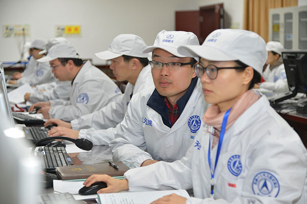 Engineers from the China Academy of Space Technology work on the research and development of Shijian 13, the first Chinese-made high-throughput satellite. (Photo provided to China Daily)