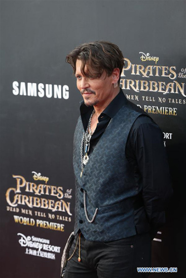 Actor Johnny Depp attends the global premiere of Hollywood film Pirates of the Caribbean: Dead Men Tell No Tales, in Shanghai, China, May 11, 2017. (Photo/Xinhua)