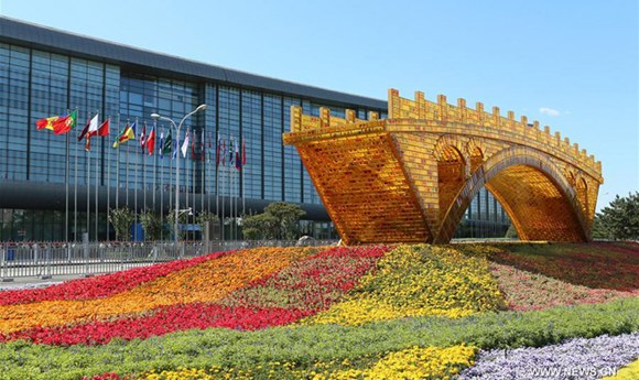 Photo taken on May 13, 2017 shows the Golden Bridge on Silk Road structure outside the National Convention Center in Beijing, capital of China. The Belt and Road Forum for International Cooperation will be held here from May 14 to 15. (Xinhua/Li He) 