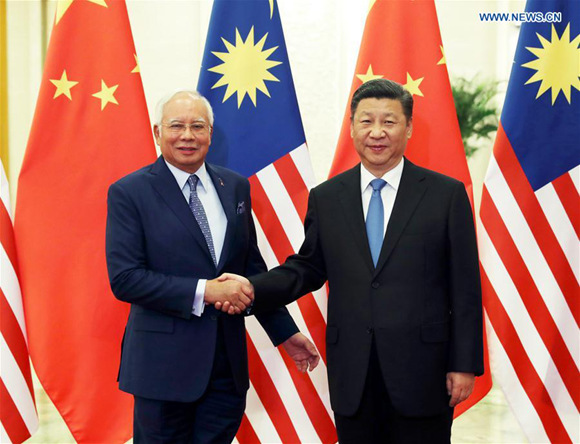 Chinese President Xi Jinping (R) meets with Malaysian Prime Minister Najib Razak, who is here to attend the Belt and Road Forum (BRF) for International Cooperation, in Beijing, capital of China, May 13, 2017. (Xinhua/Ma Zhancheng)