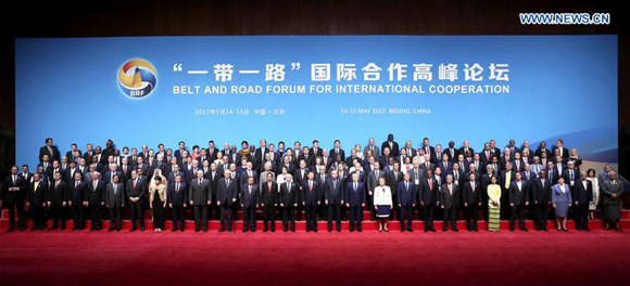 Chinese President Xi Jinping and other delegates attending the Belt and Road Forum (BRF) for International Cooperation pose for a group photo in Beijing, capital of China, May 14, 2017. Xi attended the opening ceremony of the forum and delivered a keynote speech. (Xinhua/Pang Xinglei)