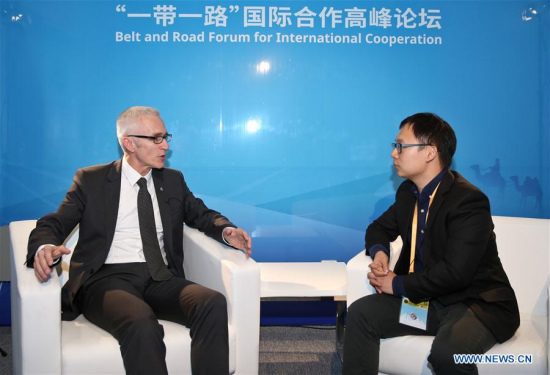 Secretary General of Interpol Jurgen Stock (L) receives an interview with Xinhua News Agency in Beijing, China, May 14, 2017.(Xinhua/Cheng Tingting) 