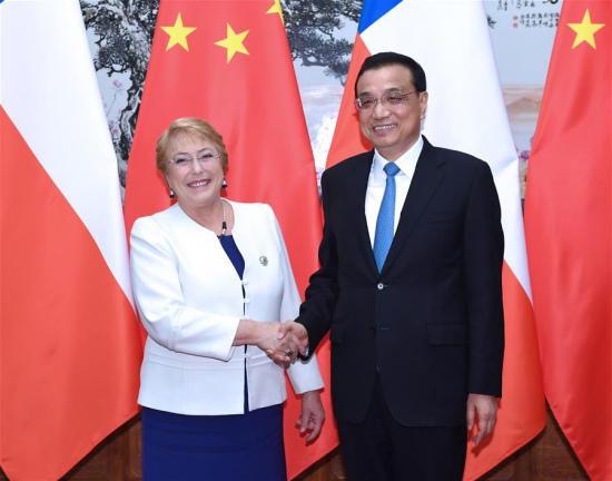 Chinese Premier Li Keqiang (R) meets with Chilean President Michelle Bachelet, who is here for a state visit and the Belt and Road Forum (BRF) for International Cooperation, at the Great Hall of the People in Beijing, capital of China, May 14, 2017. (Xinhua/Rao Aimin)