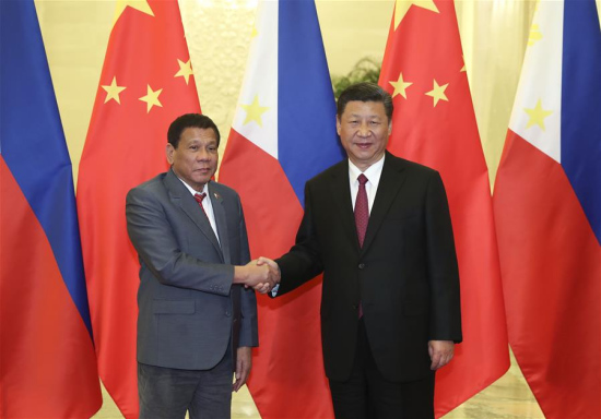 Chinese President Xi Jinping (R) meets with Philippine President Rodrigo Duterte, who is here for the Belt and Road Forum (BRF) for International Cooperation, at the Great Hall of the People in Beijing, capital of China, May 15, 2017. (Xinhua/Pang Xinglei)