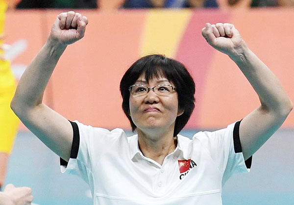 Lang Ping, coach of China's national women volleyball team celebrates victory in the final at the 2016 Rio Olympics on Aug 20, 2016. (Photo/Xinhua)