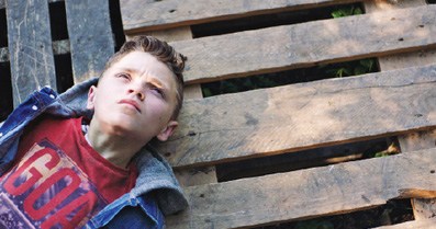 Mitchell Norman, the star of Giantland, poses for a publicity photo ahead of the release of the China backed movie. CHINA DAILY