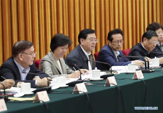 Zhang Dejiang (3rd L), chairman of the Standing Committee of the National People's Congress (NPC), presides over a meeting on monitoring the implementation of a solid waste control law in Beijing, capital of China, May 22, 2017. (Xinhua/Pang Xinglei)