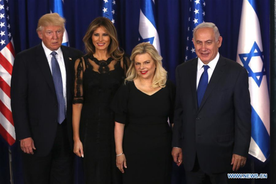 U.S. President Donald Trump (1st, L) and his wife Melania Trump (2nd L) pose for photos with Israeli Prime Minister Benjamin Netanyahu (1st, R) and his wife Sara Netanyahu in Jerusalem, on May 22, 2017. (Xinhua/JINI/POOL/Marc Israel Sellem)