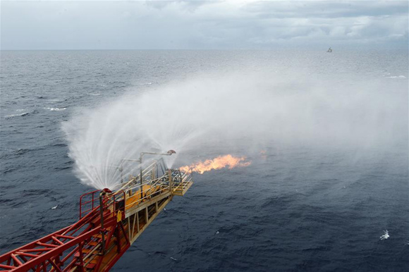 Photo taken on May 16, 2017 shows the flames spouting from the trial mining site in the Shenhu area of the South China Sea. China has succeeded in collecting samples of combustible ice in the South China Sea, a major breakthrough that may lead to a global energy revolution, Minister of Land and Resources Jiang Daming said Thursday. (Xinhua/Liang Xu)