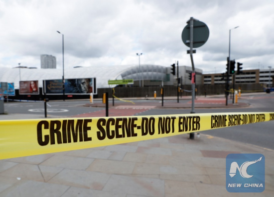 Police secure theManchesterArena in Manchester, Britain, May 23, 2017. A total of 22 people were killed and 59 others injured in a suicide terrorattackatManchesterArena Monday night. (Xinhua/Han Yan)